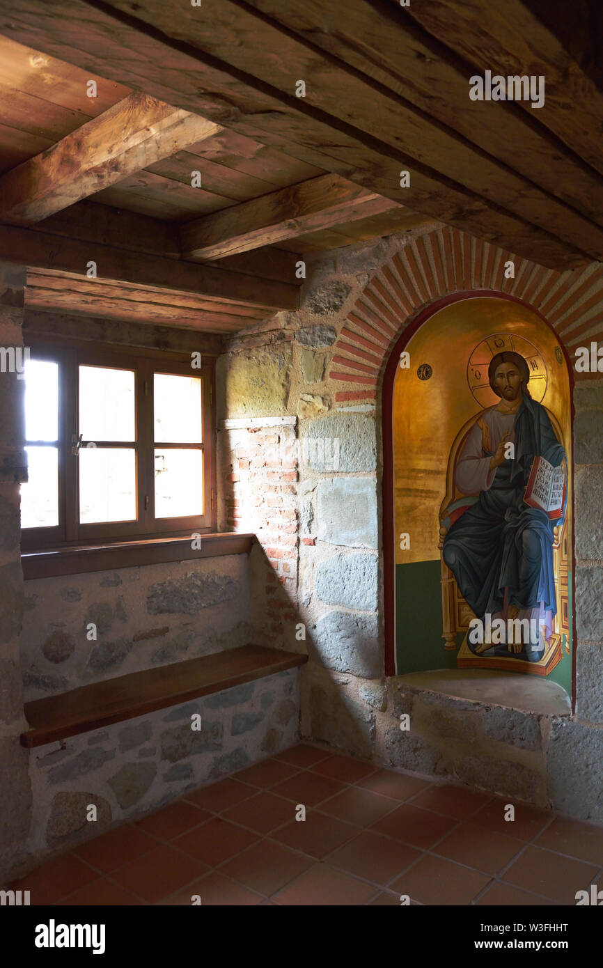 METEORA,GREECE/AUGUST 8,2018: Icon of Jesus Christ next to a window  in the Holy Monastery of Holy Trinity Stock Photo