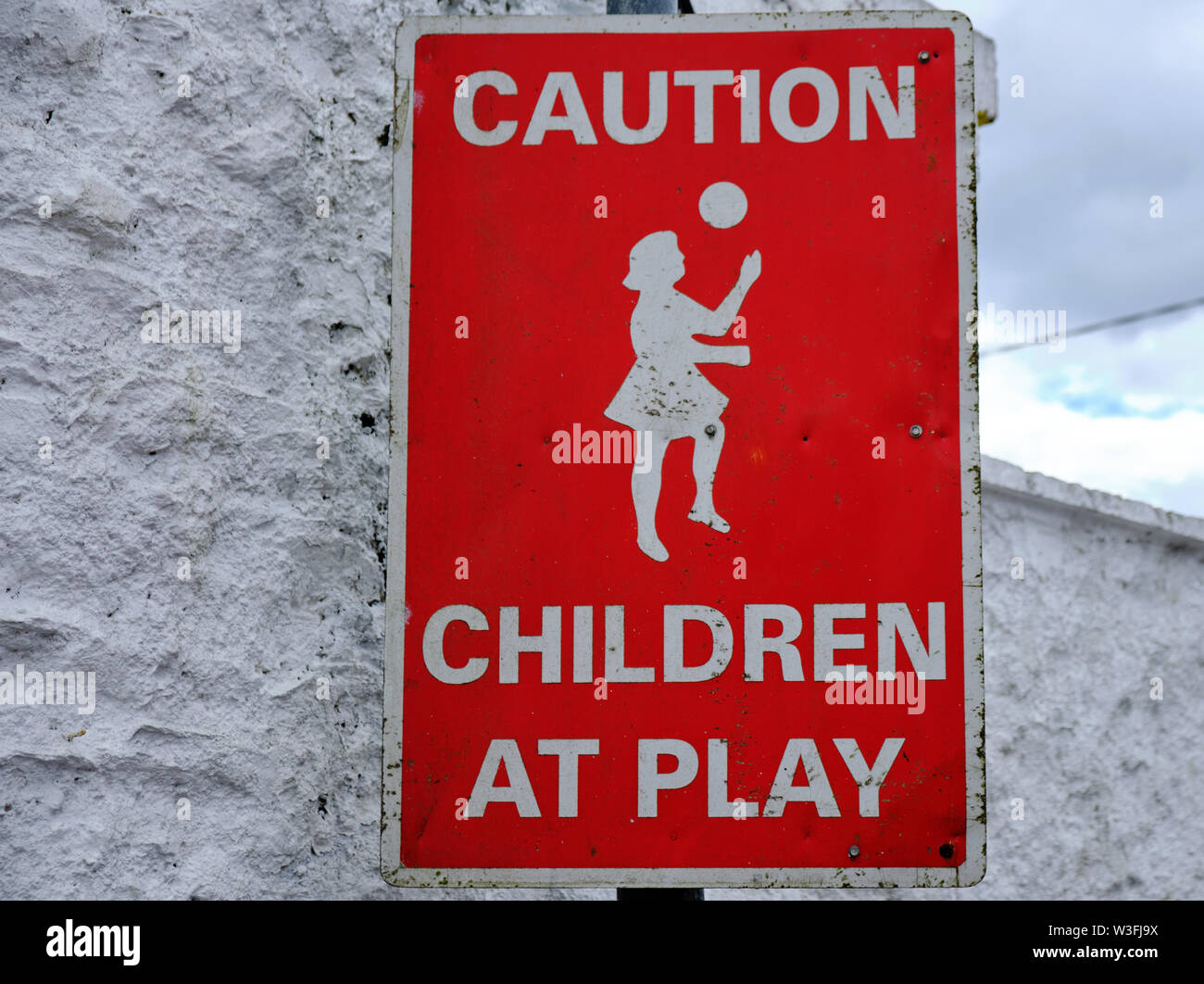 Traffic sign caution children play hi-res stock photography and