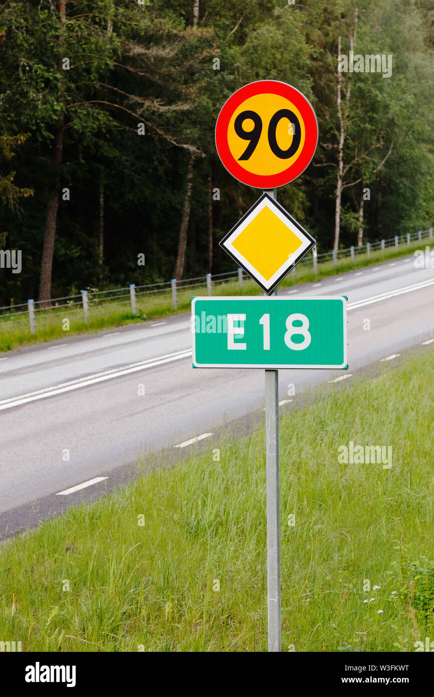 Primary European road number E18 speed limited 90 kmh road sign combination. Stock Photo