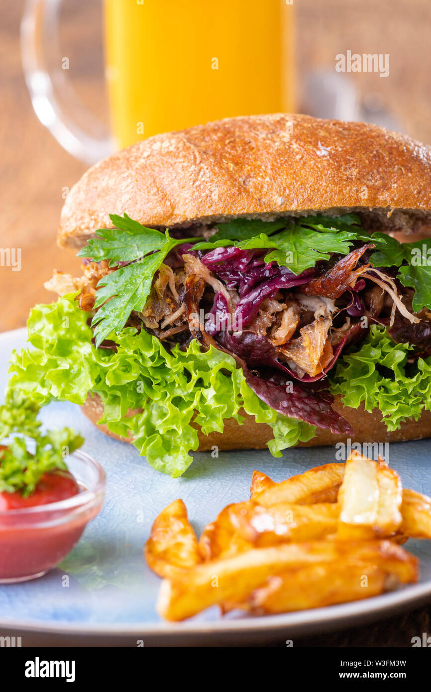 pulled pork in a bun with beer Stock Photo