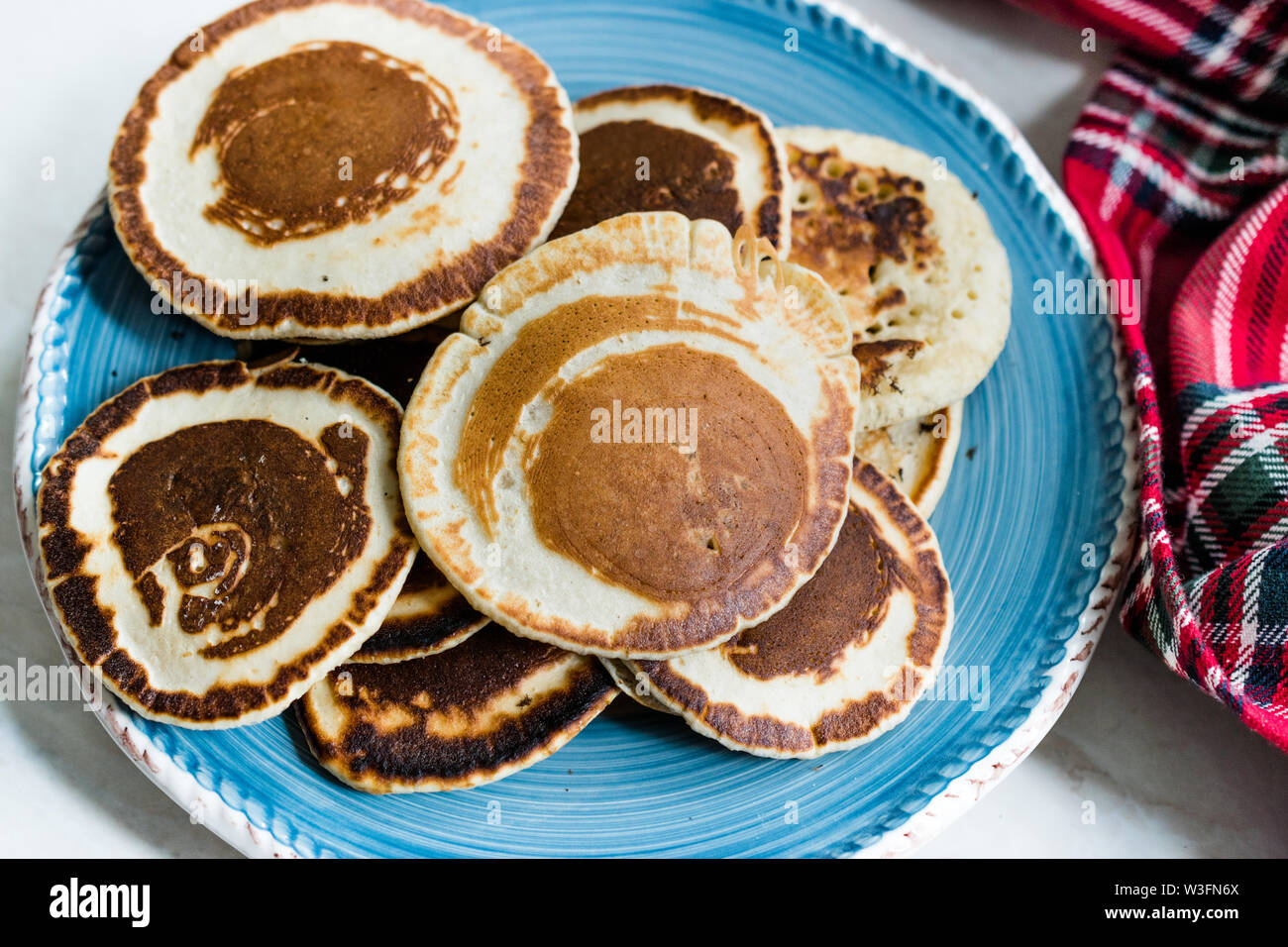 Stack of Plain Pancakes in Plate for Breakfast. Stock Photo