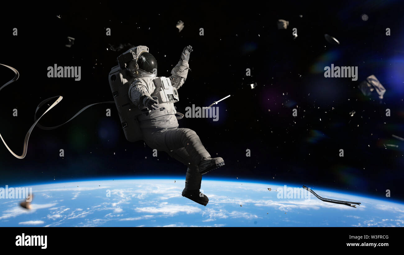 astronaut hit by space debris in orbit of planet Earth Stock Photo