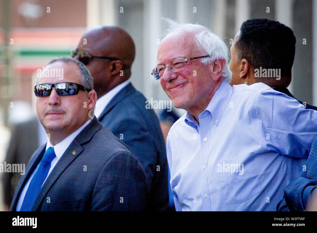 Philadelphia, Pennsylvania, USA. 15th July, 2019. July 15, 2019 - Senator Bernie Sanders arrives at a rally gathered to protest the closure of Hahnemann University Hospital in Philadelphia, PA, July 15, 2019. Hahnemann, a busy urban healthcare center, is facing imminent closure after being acquired by a hedge fund that is looking to raze the building and turn the land into rental or retail properties. (Credit Image: © Michael CandeloriZUMA Wire) Credit: ZUMA Press, Inc./Alamy Live News Stock Photo