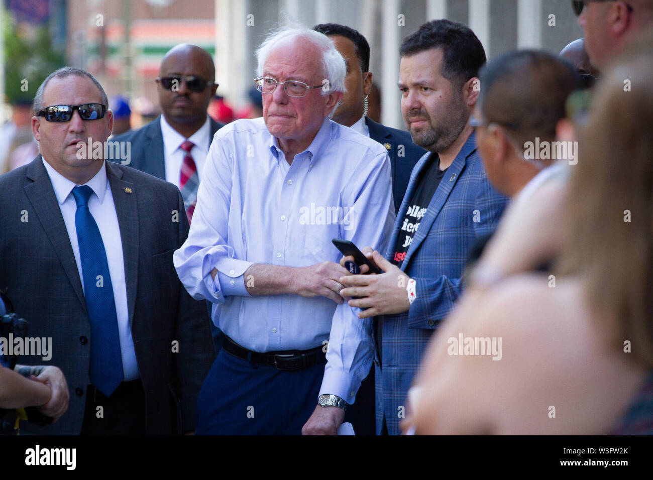 Philadelphia, Pennsylvania, USA. 15th July, 2019. July 15, 2019 - Senator Bernie Sanders arrives at a rally gathered to protest the closure of Hahnemann University Hospital in Philadelphia, PA, July 15, 2019. Hahnemann, a busy urban healthcare center, is facing imminent closure after being acquired by a hedge fund that is looking to raze the building and turn the land into rental or retail properties. (Credit Image: © Michael CandeloriZUMA Wire) Credit: ZUMA Press, Inc./Alamy Live News Stock Photo