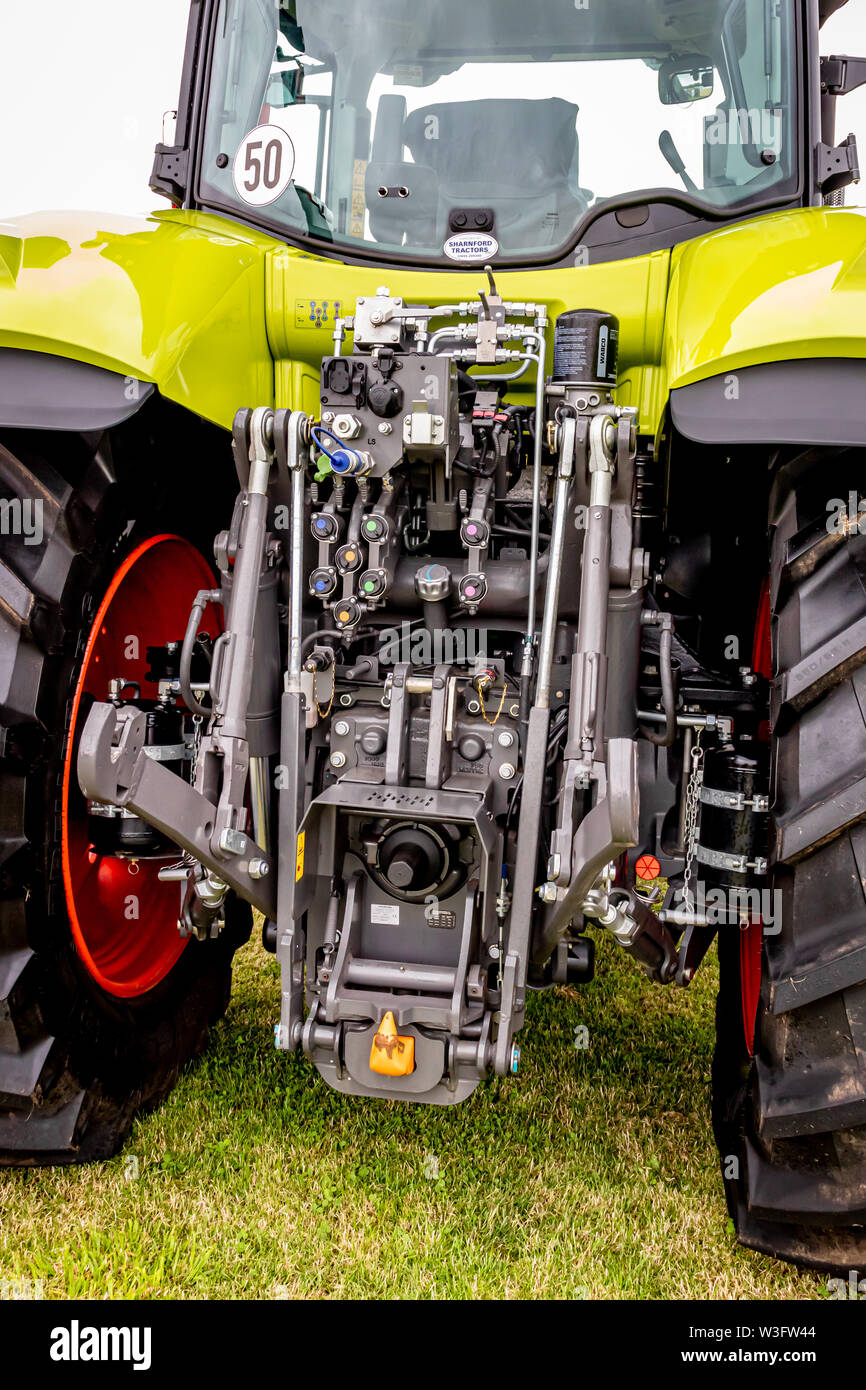 Modern Agricultural Tractors and Farm Machinery at a Country Fair and Agricultural Show in Leicestershire .UK Stock Photo