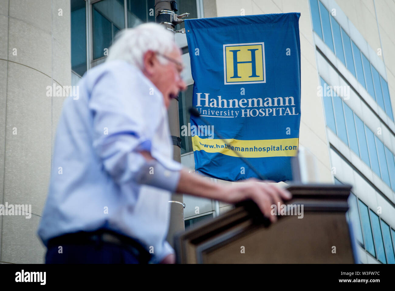 Philadelphia, Pennsylvania, USA. 15th July, 2019. Senator Bernie Sanders addresses the crowd at a rally gathered to protest the closure of Hahnemann University Hospital in Philadelphia, PA, July 15, 2019. Hahnemann, a busy urban healthcare center, is facing imminent closure after being acquired by a hedge fund that is looking to raze the building and turn the land into rental or retail properties. 15th July, 2019. Credit: Michael Candelori/ZUMA Wire/Alamy Live News Credit: ZUMA Press, Inc./Alamy Live News Stock Photo