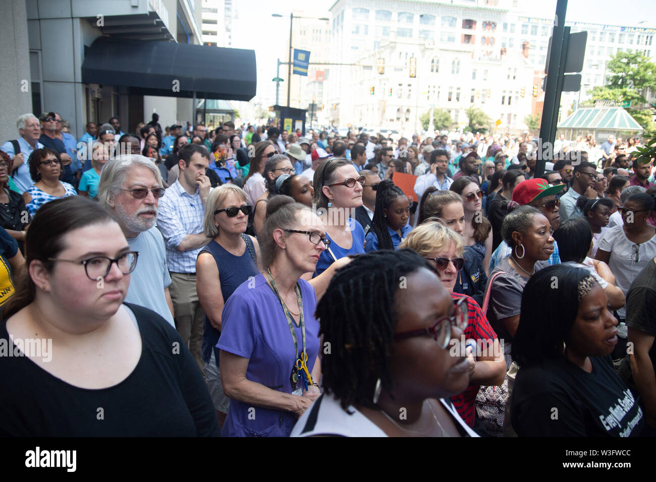 Philadelphia, Pennsylvania, USA. 15th July, 2019. A crowd of hundreds gathers to protest the closure of Hahnemann University Hospital in Philadelphia, PA, July 15, 2019. Hahnemann, a busy urban healthcare center, is facing imminent closure after being acquired by a hedge fund that is looking to raze the building and turn the land into rental or retail properties. 15th July, 2019. Credit: Michael Candelori/ZUMA Wire/Alamy Live News Credit: ZUMA Press, Inc./Alamy Live News Stock Photo