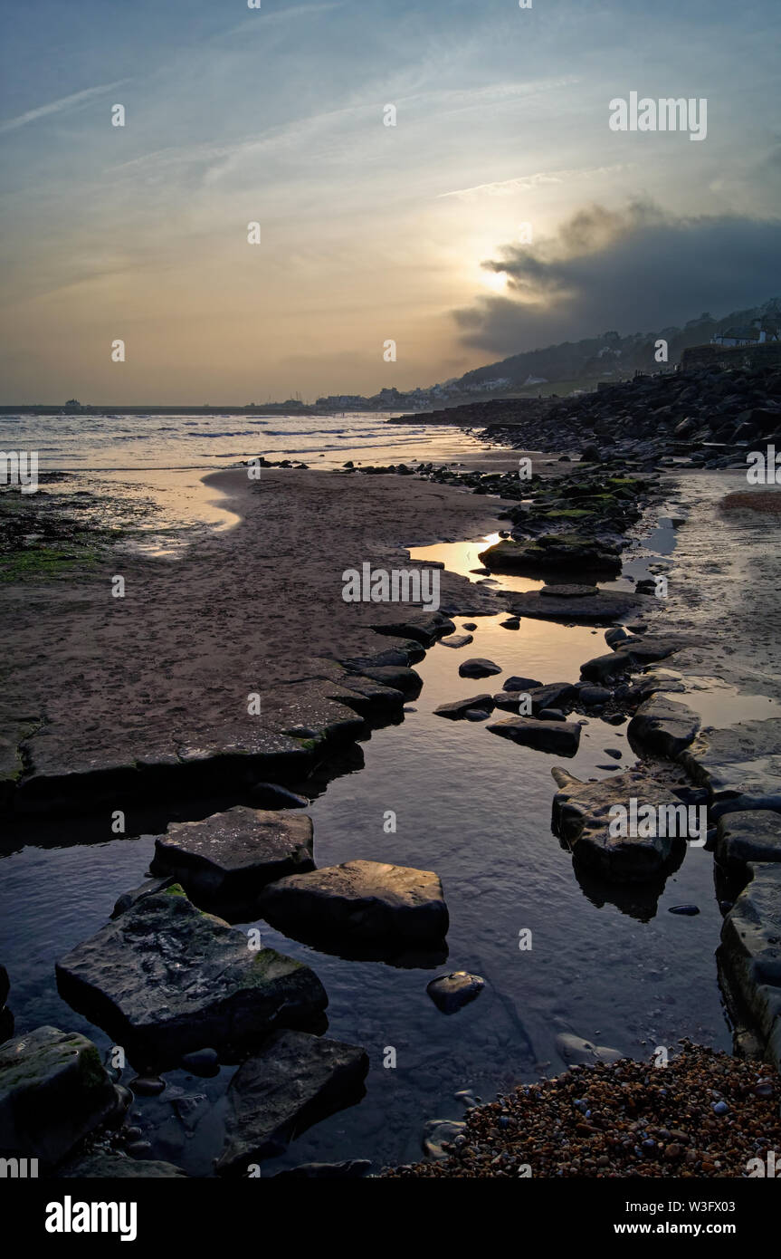UK,Dorset,Lyme Regis,Church Beach Sunset Stock Photo