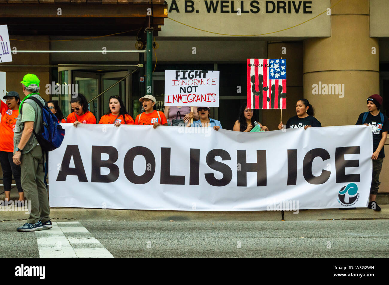 Downtown, Chicago-July 13, 2019: Protest against ICE and Customs and Border Patrol Detention Centers. Group with 'Abolish ICE' banner. Stock Photo