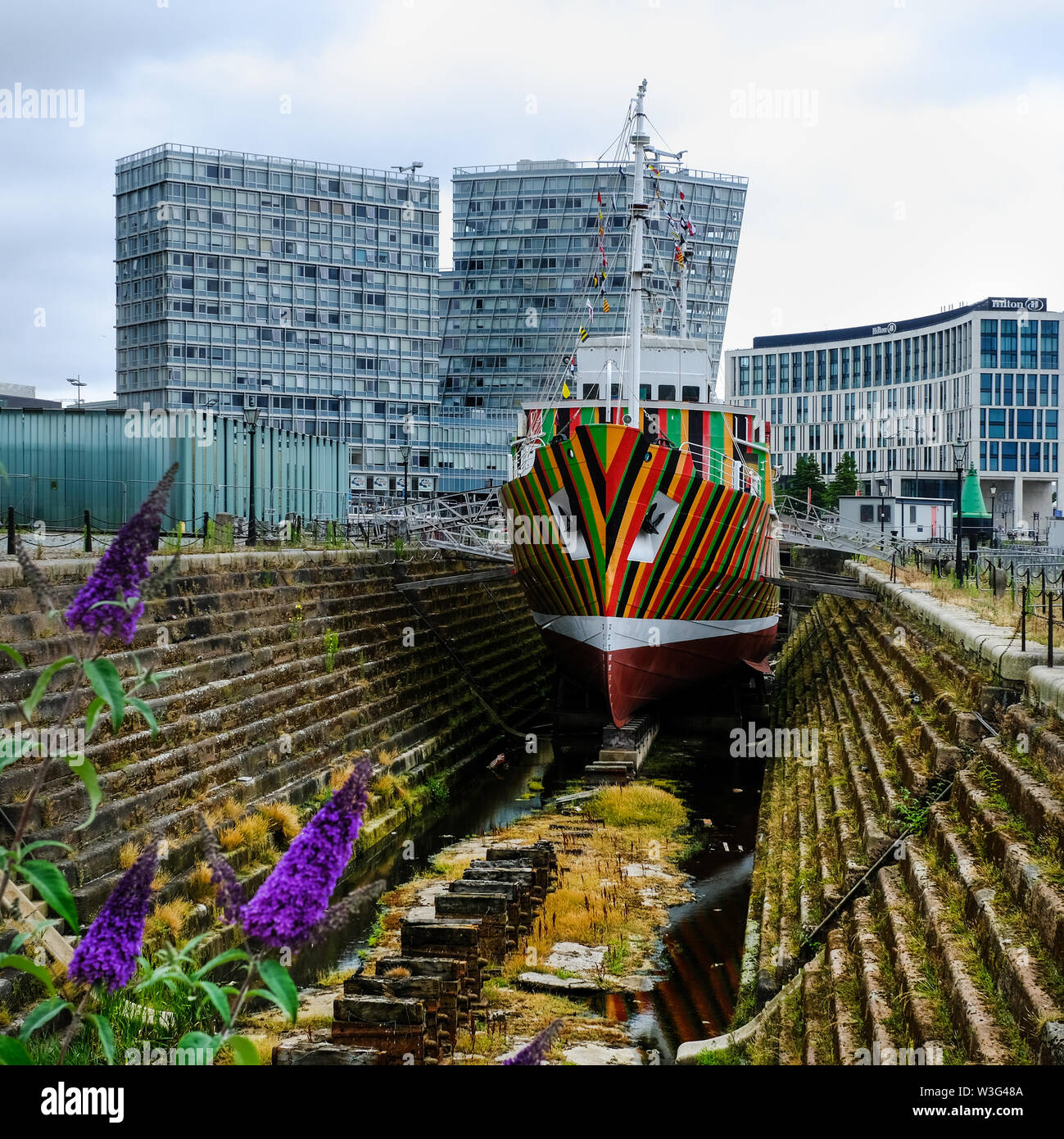 'Dazzle Ship' in Canning Graving dock, Liverpool, UK by Venezuelan artist Carlos Cruz-Diez. Stock Photo