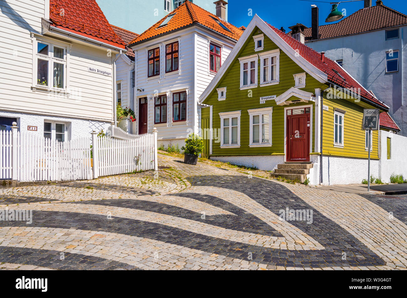 Old wooden houses and narrow streets in the pittoresk part of Bergen, Norway, called Nordnes. Stock Photo