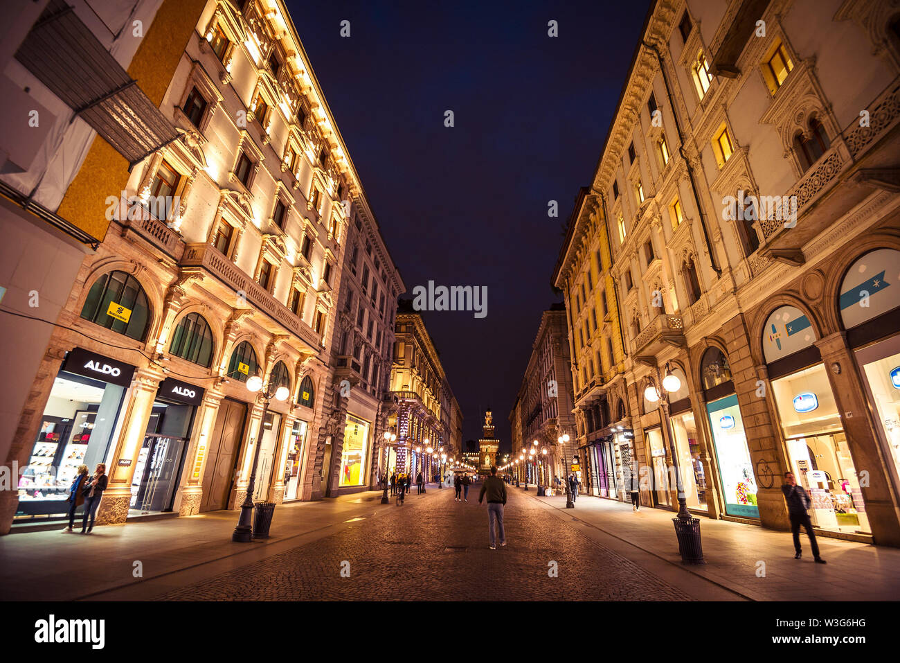 Milan, Italy - May 2nd, 2019 - Night photo of Milan city streets. Toned image Stock Photo