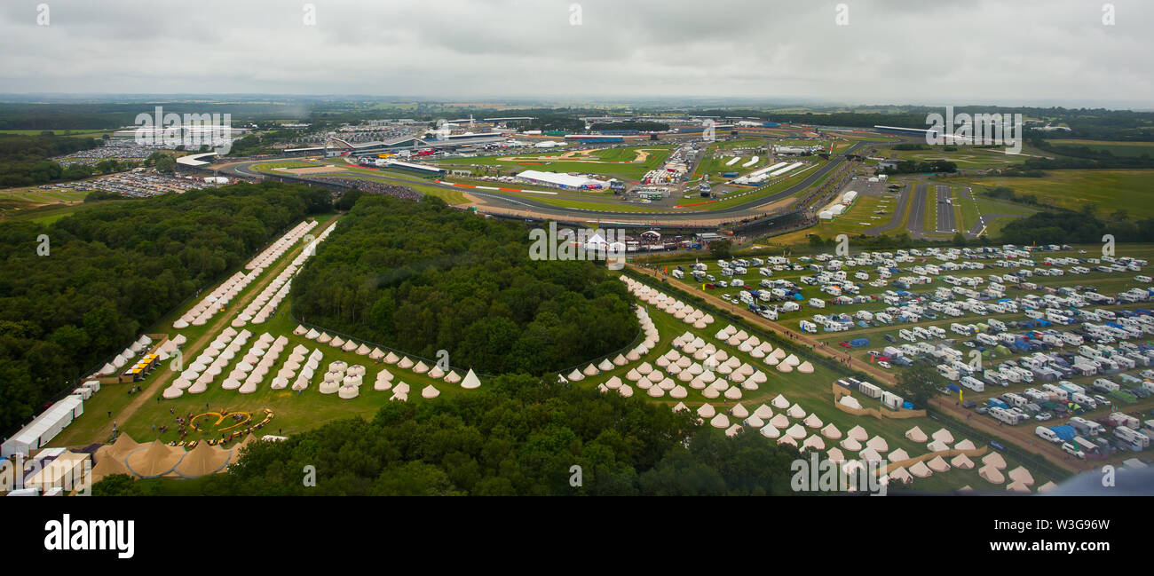 An aerial view of the Luxury Glamping bell tent field at Silverstone Woodlands Campsite on the edge of Silverstone Circuit on F1 race day 2019 from a Stock Photo