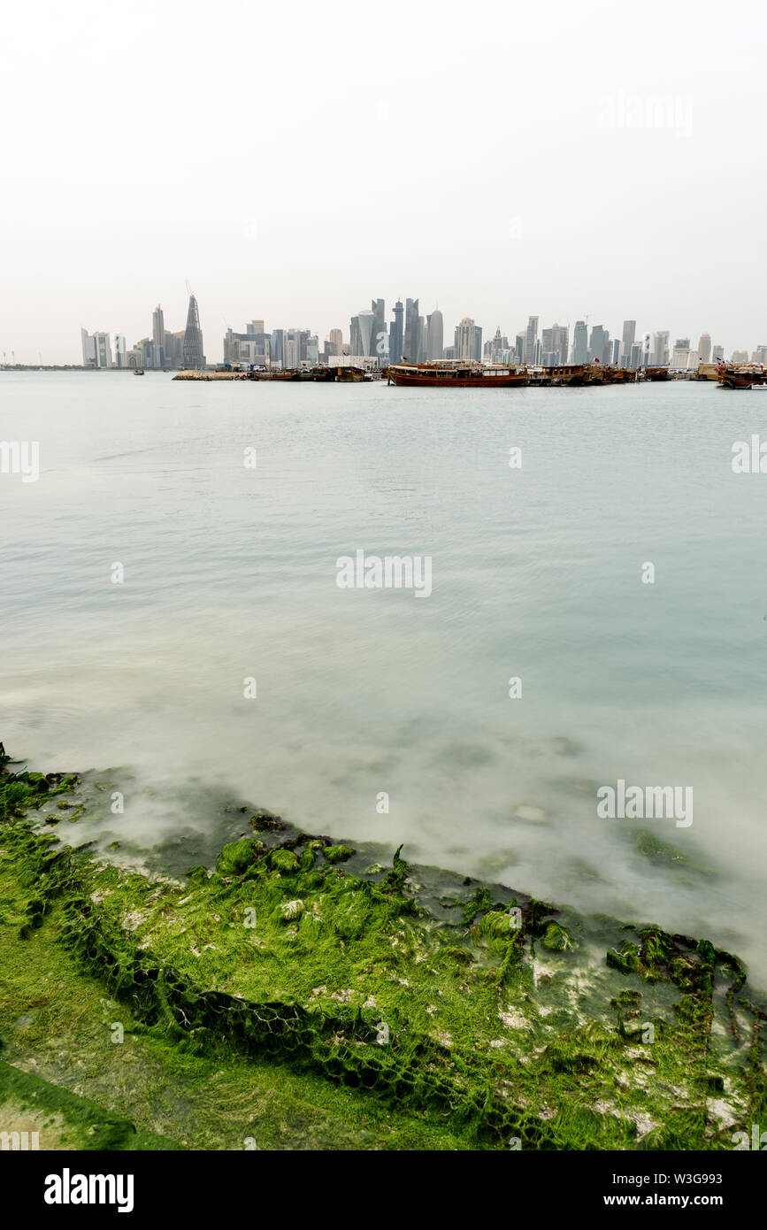 View of Doha skyline  across the sea shore Stock Photo