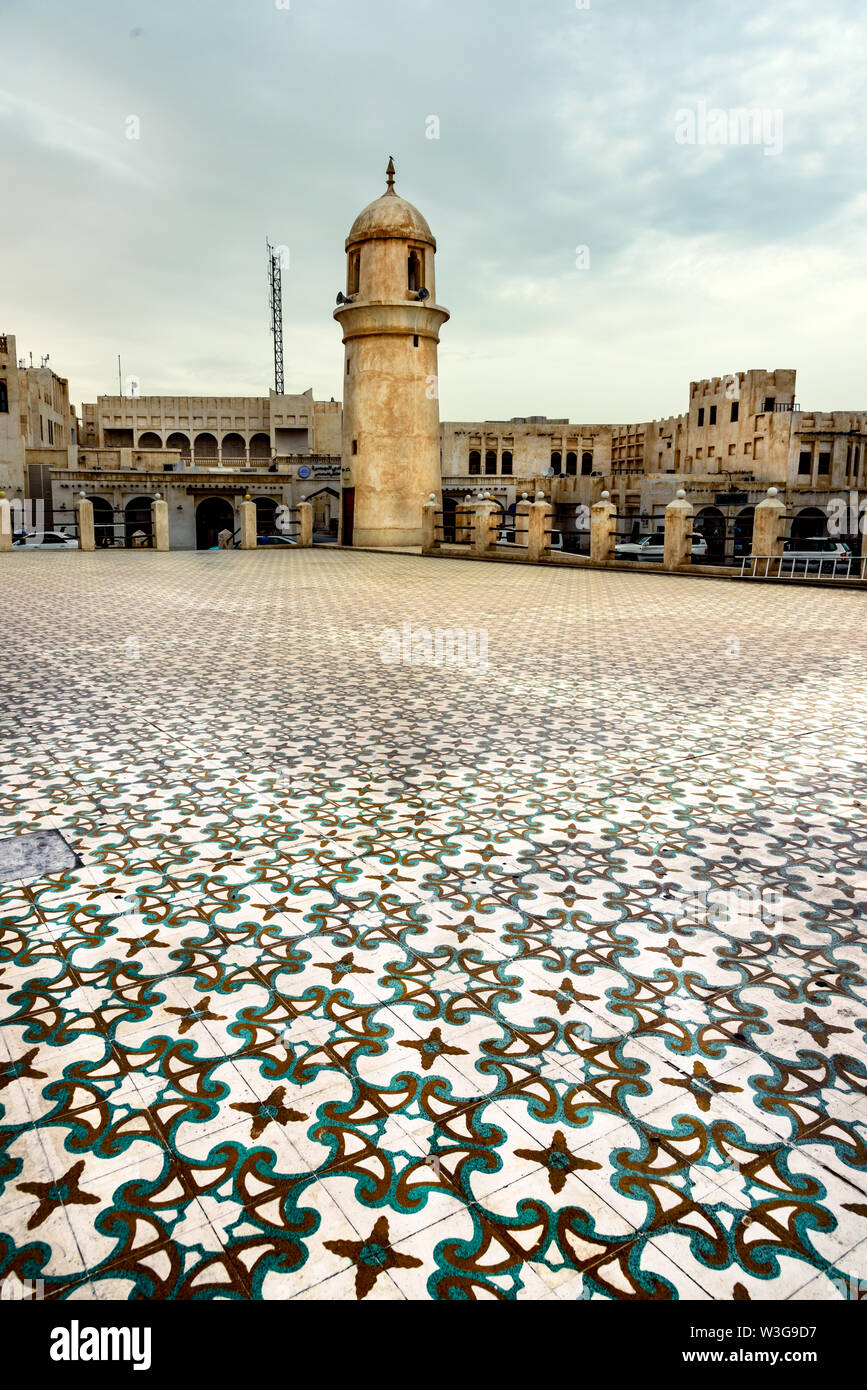 Floral tiled courtyard of a mosque in Doha Qatar Stock Photo