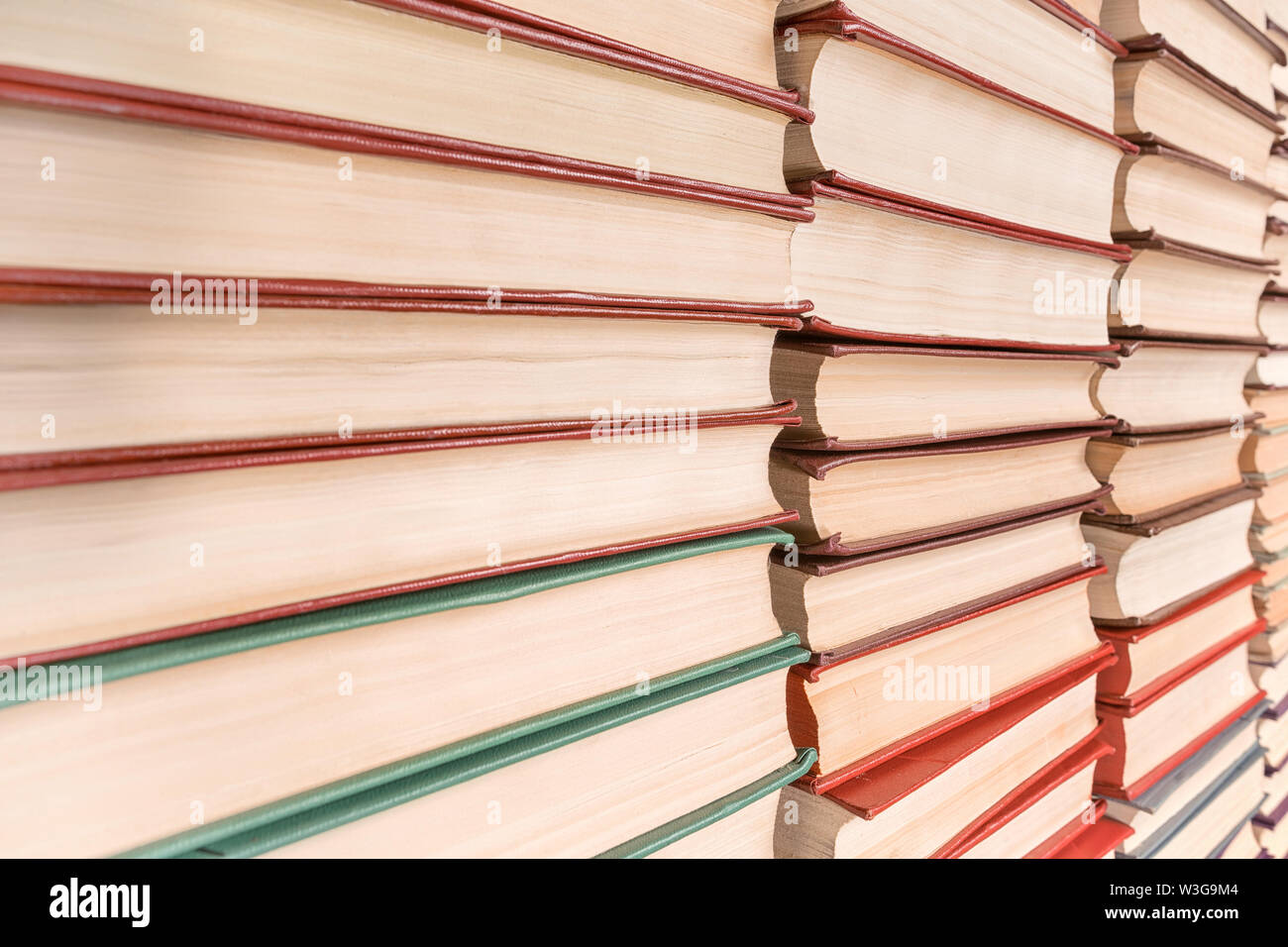 Books pile diminishing perspective view. Texture and background Stock Photo