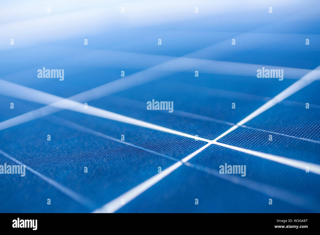 Solar Energy solar cell connections, silicon and encapsulant a nice technology blue pattern. Perspective view of Poly crystalline silicon Solar Cells Stock Photo