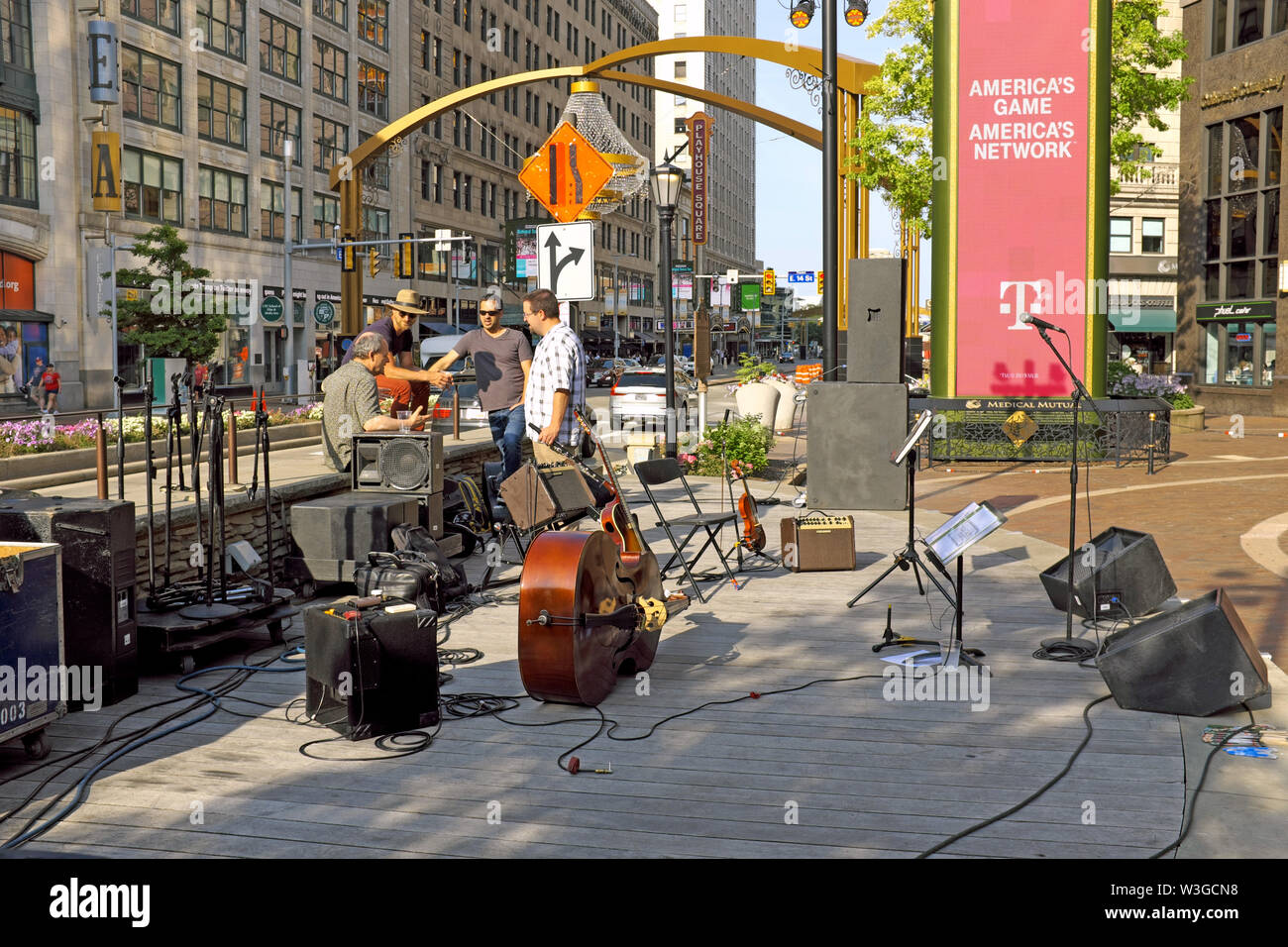 A band takes a break during their live outdoor concert in the U.S. Bank Plaza of Playhouse Square in Cleveland, Ohio on July 9, 2019. Stock Photo