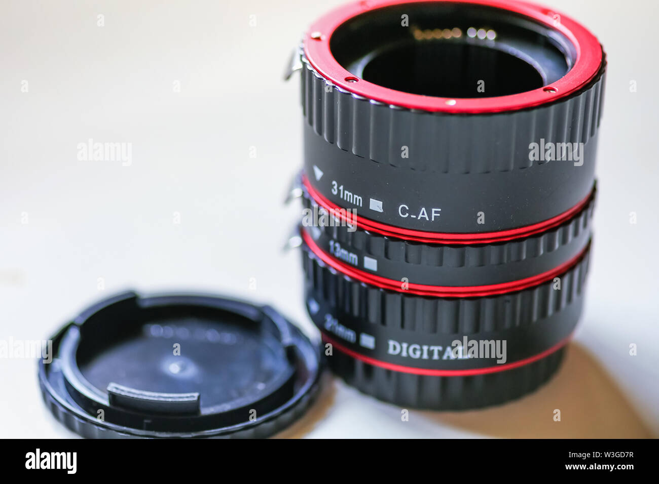 Macro photography camera lens extension tubes in white background Stock