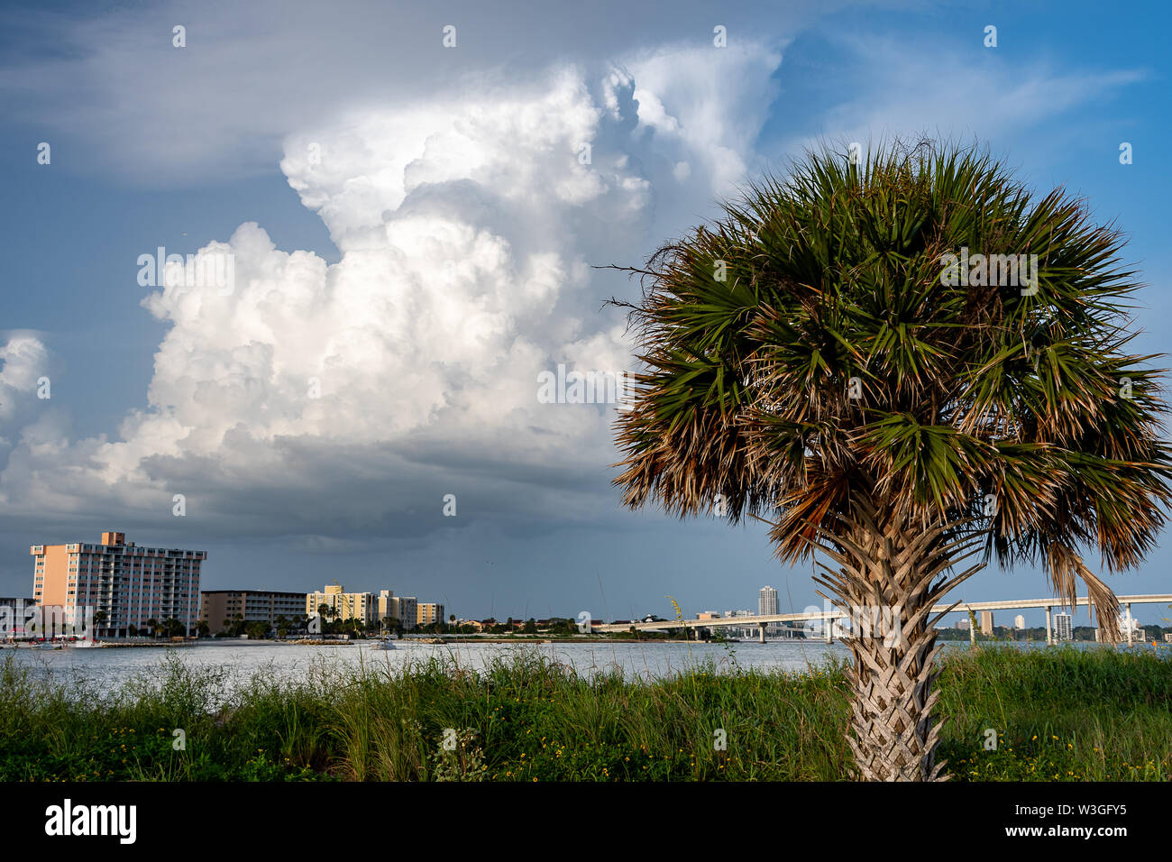 Clouds gather in the sky at the beach for the summer storms in Florida Stock Photo