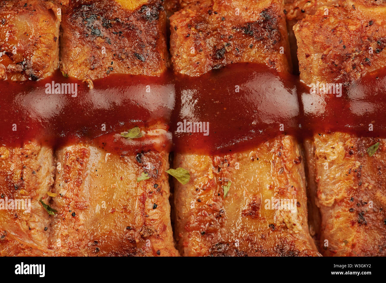 Grilled pork ribs with ketchup macro close up view Stock Photo Alamy