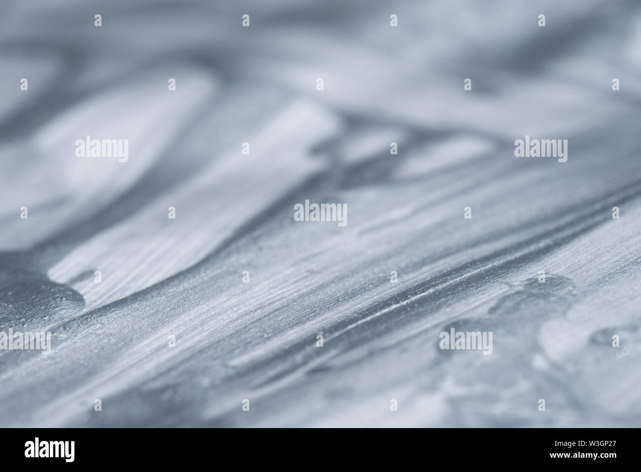 silver color painted bacground texture selective focus Stock Photo