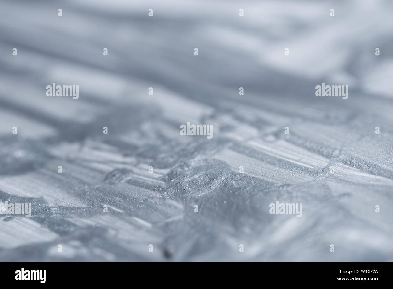 silver color painted bacground texture selective focus Stock Photo