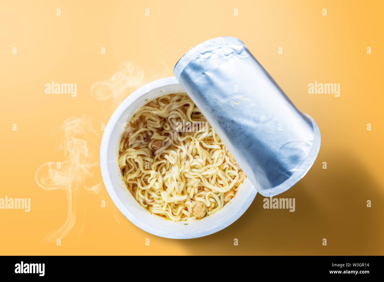Download Instant Cup Noodle On Yellow Background Stock Photo Alamy Yellowimages Mockups