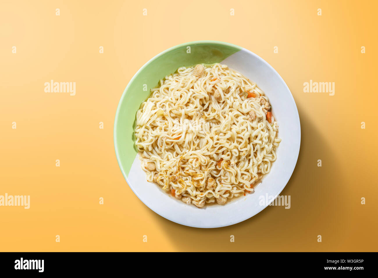 Download Noodles On The Bowl On Yellow Background Stock Photo Alamy PSD Mockup Templates