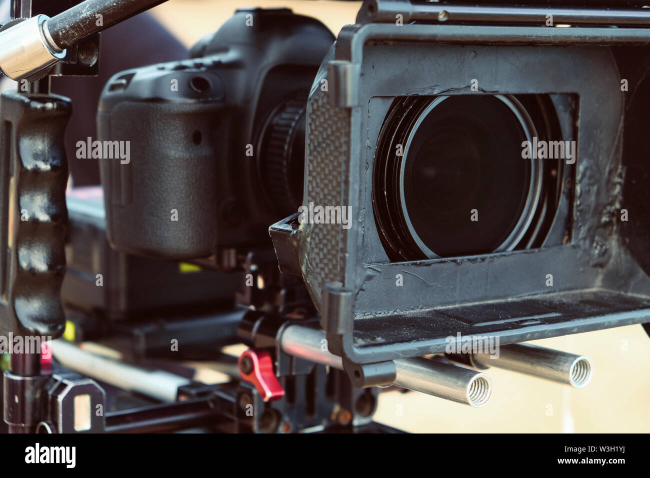 Behind the scene. cameraman shooting film scene with camera Stock Photo ...