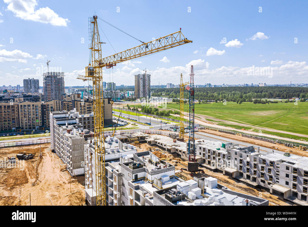 construction of new multistory apartment buildings. aerial view. blue sky background Stock Photo