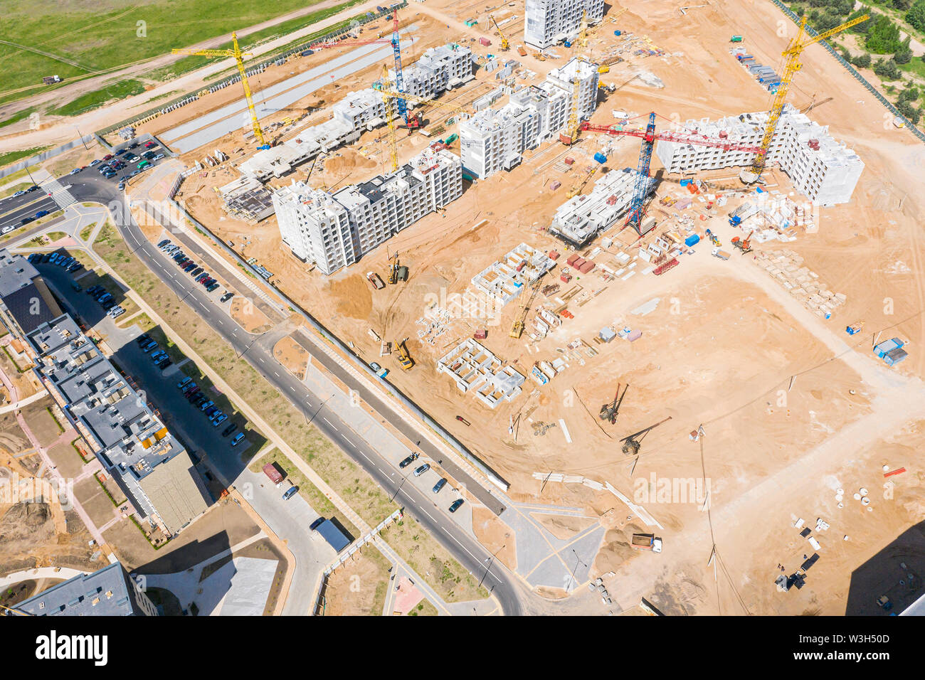 aerial view of new residential area with multistory modern apartment buildings under construction Stock Photo