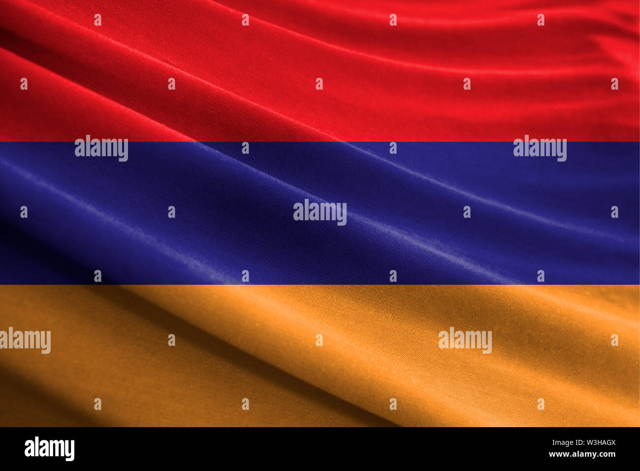 Realistic flag of Armenia on the wavy surface of fabric Stock Photo - Alamy