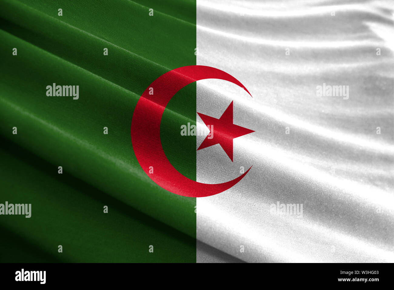 Realistic flag of Algeria on the wavy surface of fabric Stock Photo - Alamy