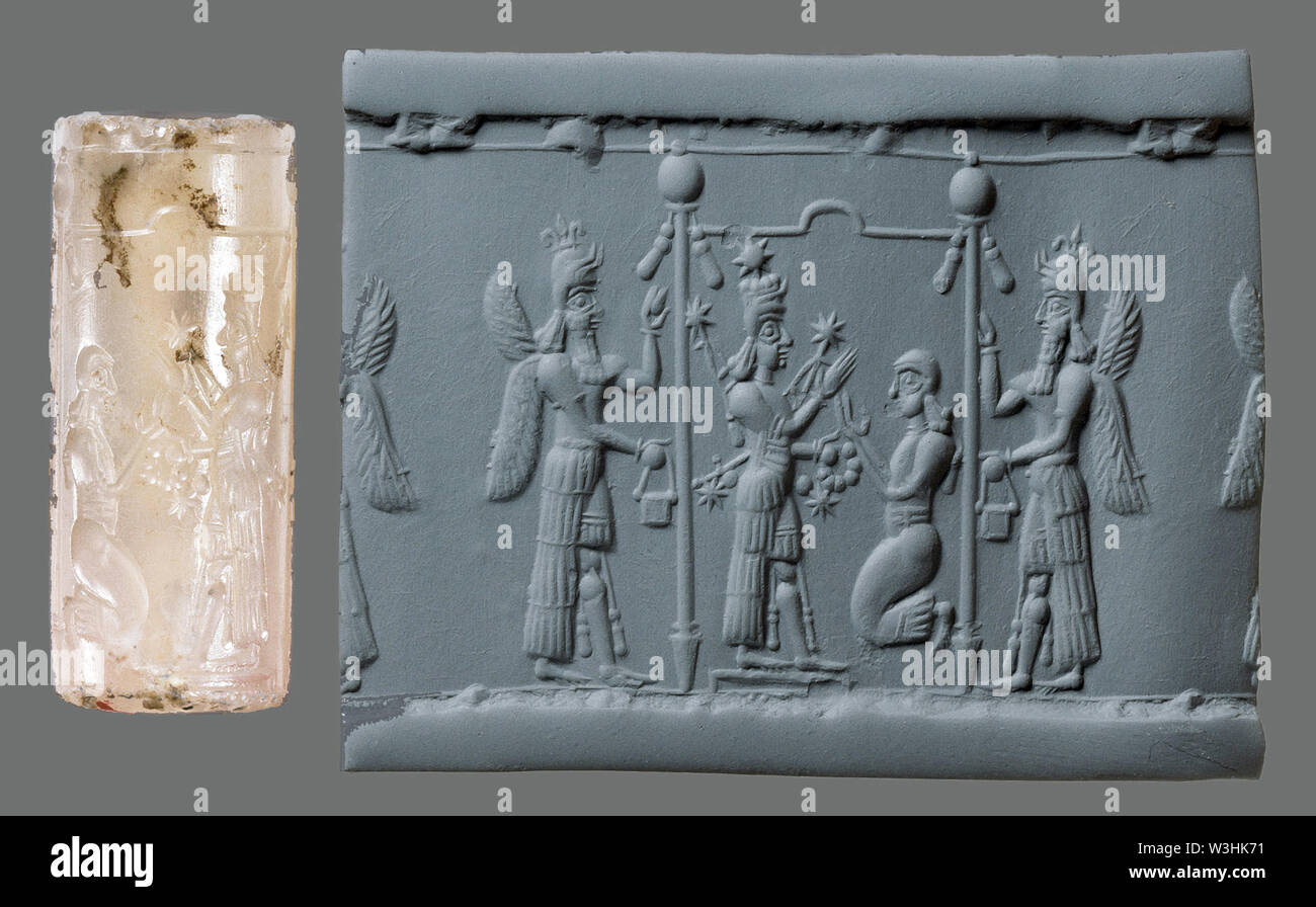 6453. Cylinder seal depicting Goddess Ishtar and worshiper with winged genies on each side. Assyria, Mesopotamia, c. 8-7th. C. BC. Stock Photo