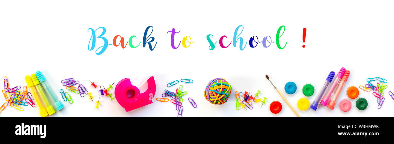 Panorama of colorful school supplies  isolated on white background with text. Back to school web banner. Stock Photo