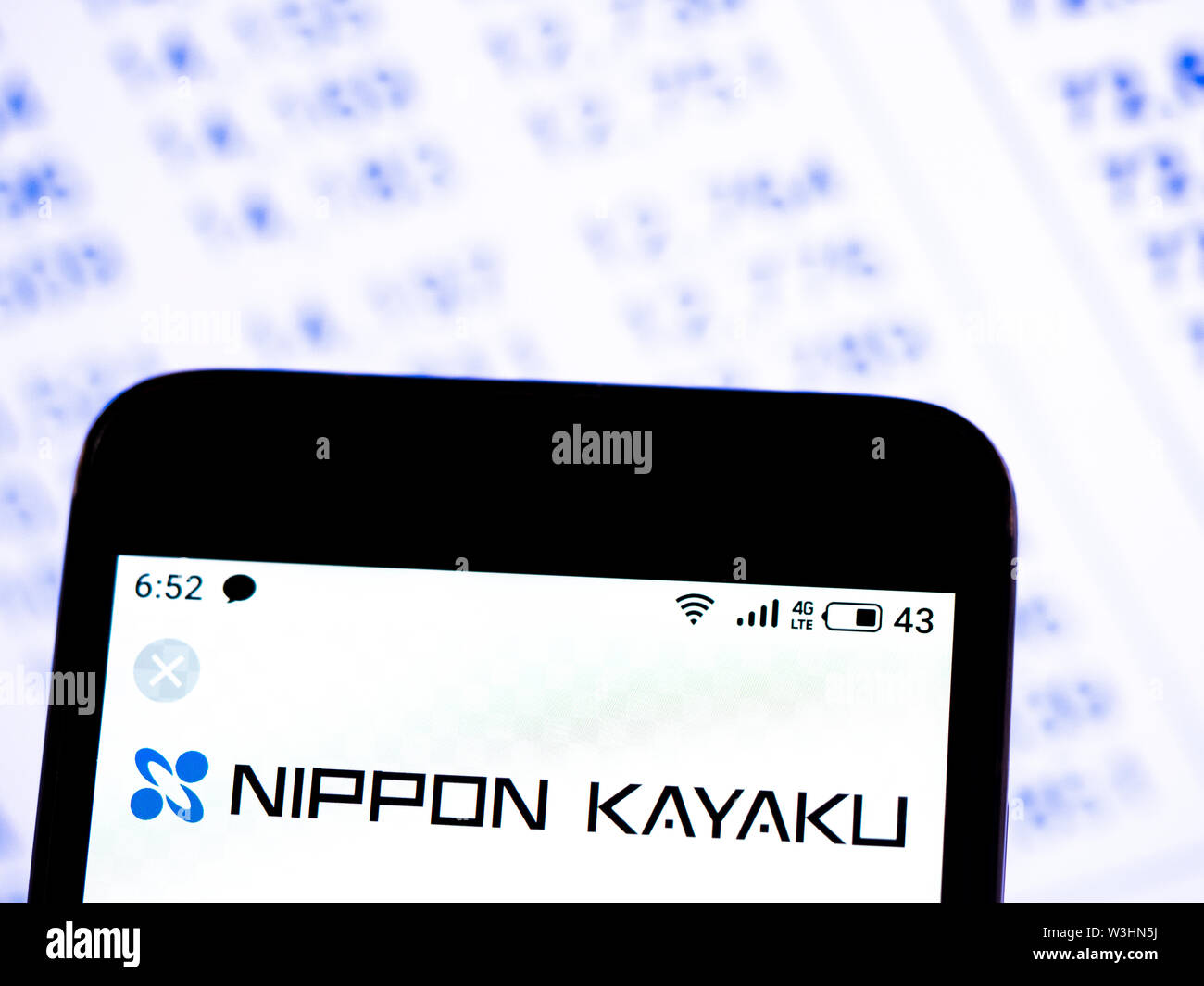 In this photo illustration the Nippon Kayaku Co., Ltd. logo is seen