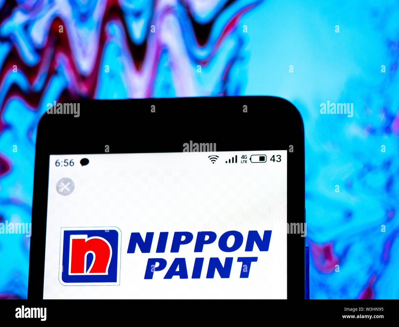 In this photo illustration the Nippon Paint Holdings Co., Ltd. logo is seen displayed on a