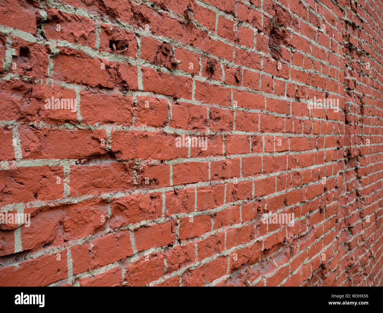 Old red wall with realistic painted brickwork Stock Photo Alamy