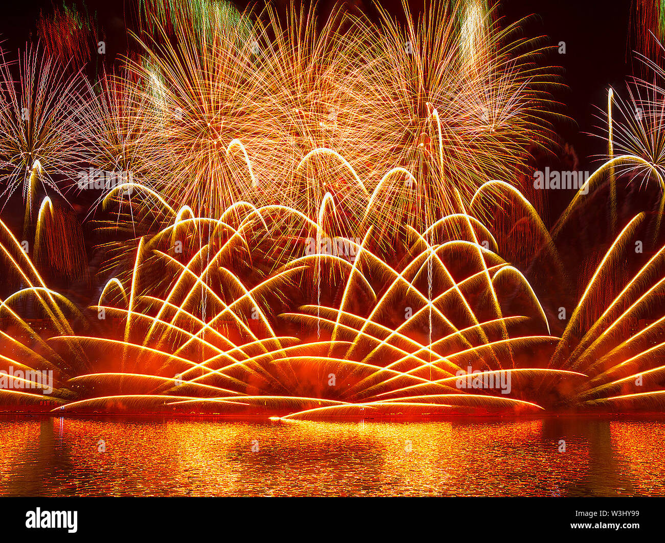 Fireworks display background at night for new year celebration Stock Photo