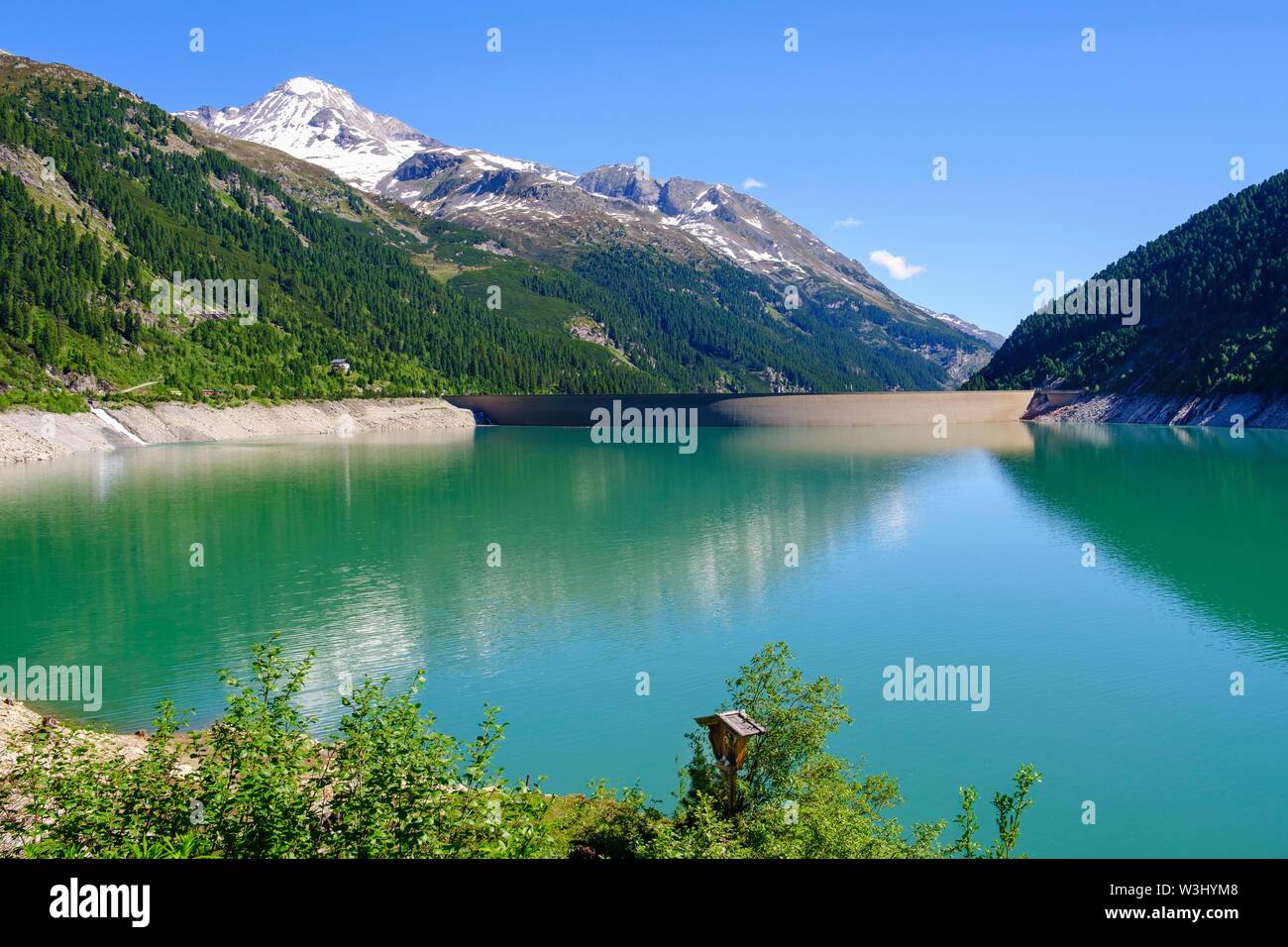 Schlegeis reservoir with dam wall, Hoher Riffler, Zillertaler Alps, near Finkenberg, Zillertal, Tyrol, Austria Stock Photo