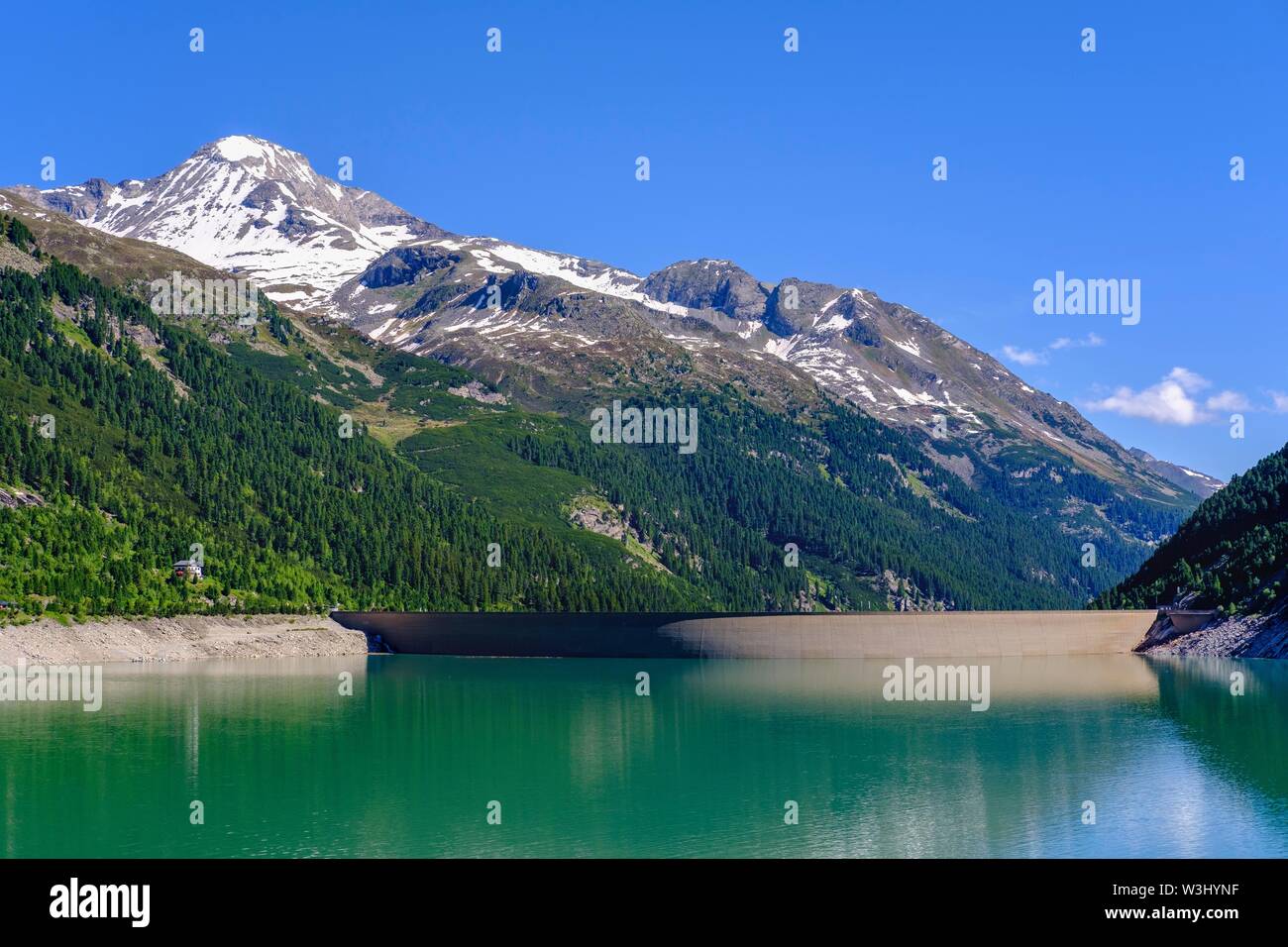 Schlegeis reservoir with dam wall, Hoher Riffler, Zillertaler Alps, near Finkenberg, Zillertal, Tyrol, Austria Stock Photo