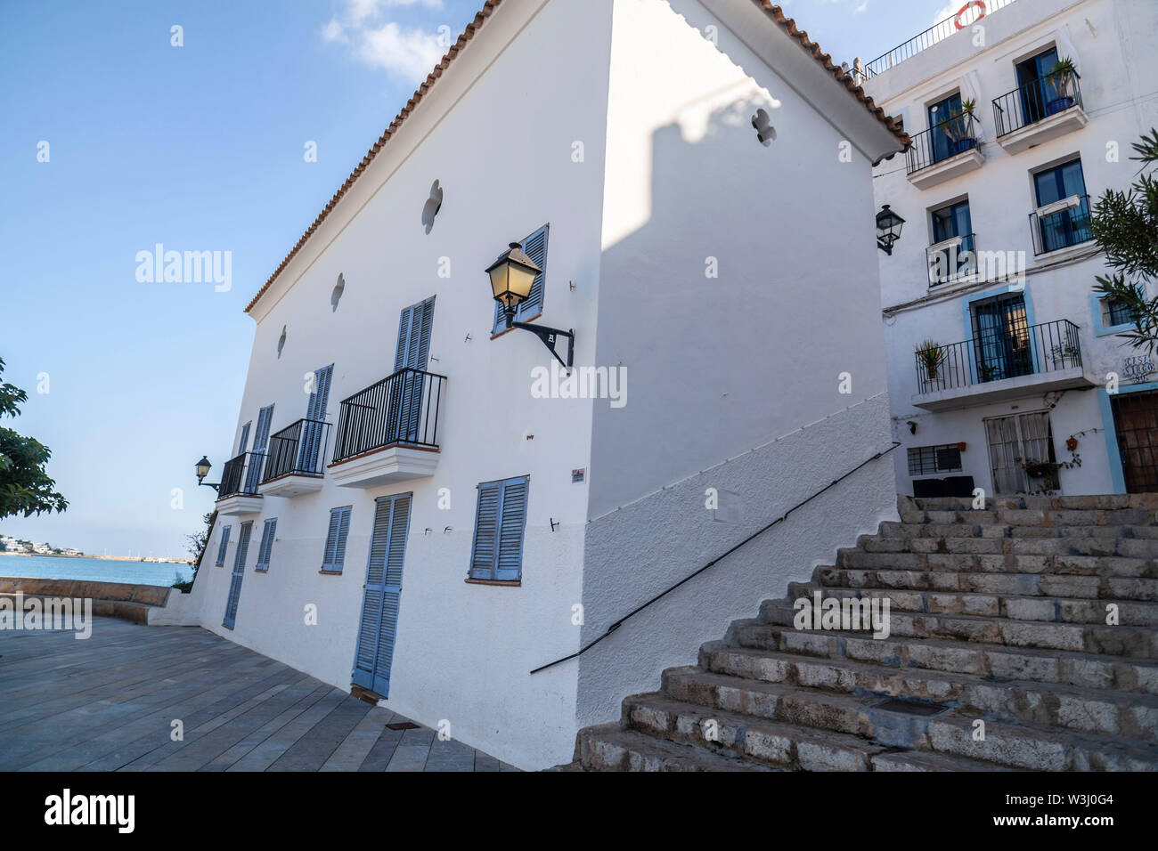White houses close to port of Ibiza, Eivissa, Balearic Islands. Spain. Stock Photo