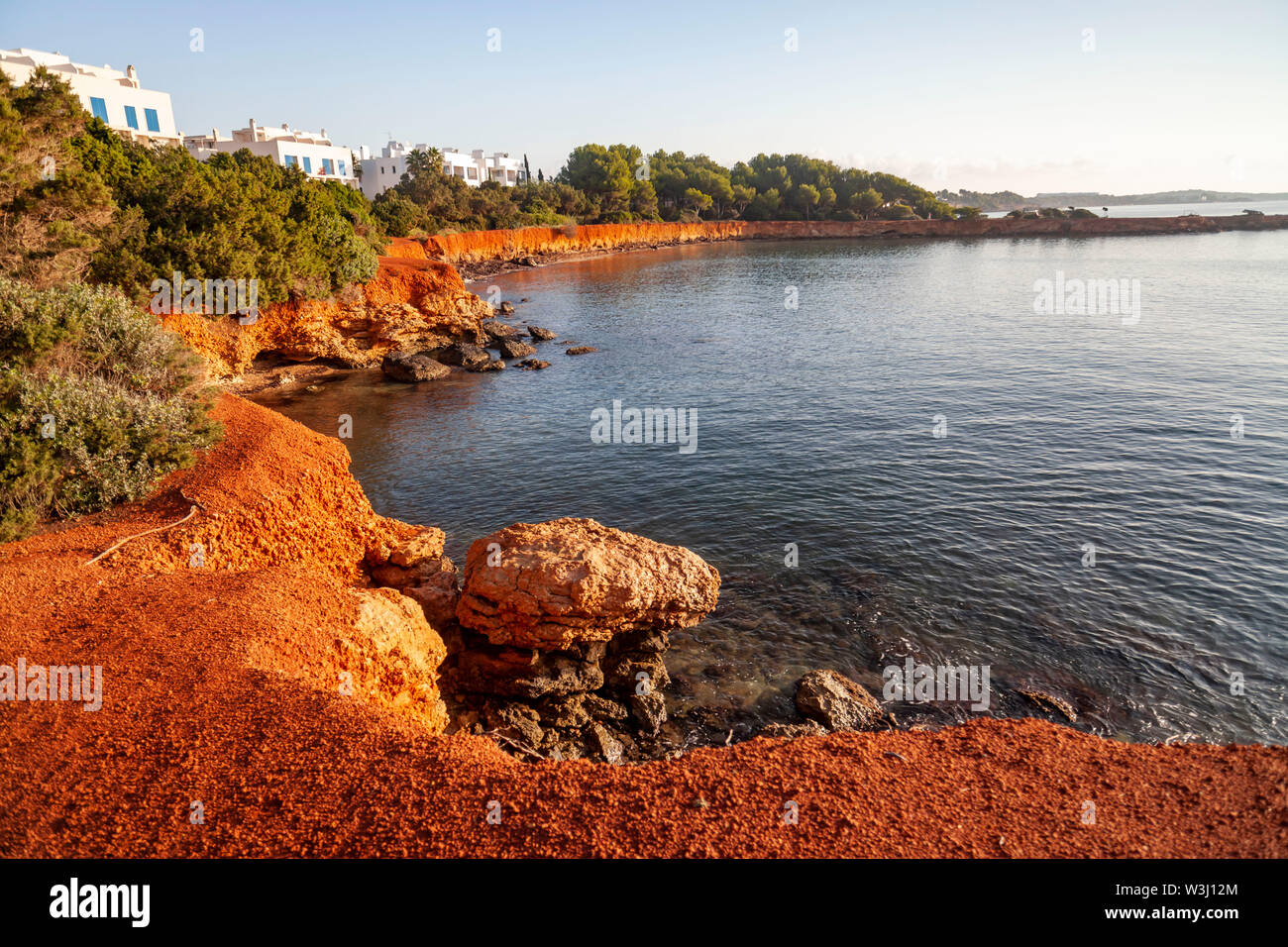 Santa Eularia des Riu, littoral, coastal, distinctive rocks ocher color. Mediterranean view, Ibiza island, Balearic Islands, Spain. Stock Photo