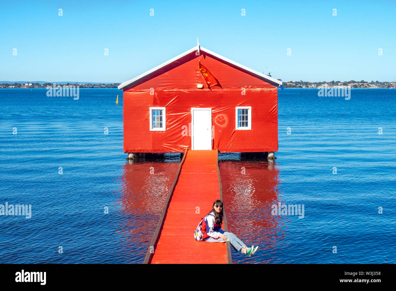 The iconic Crawley Edge Boatshed on the Swan River wrapped in red to commemorate the visit of Manchester United to Perth Western Australia. Stock Photo