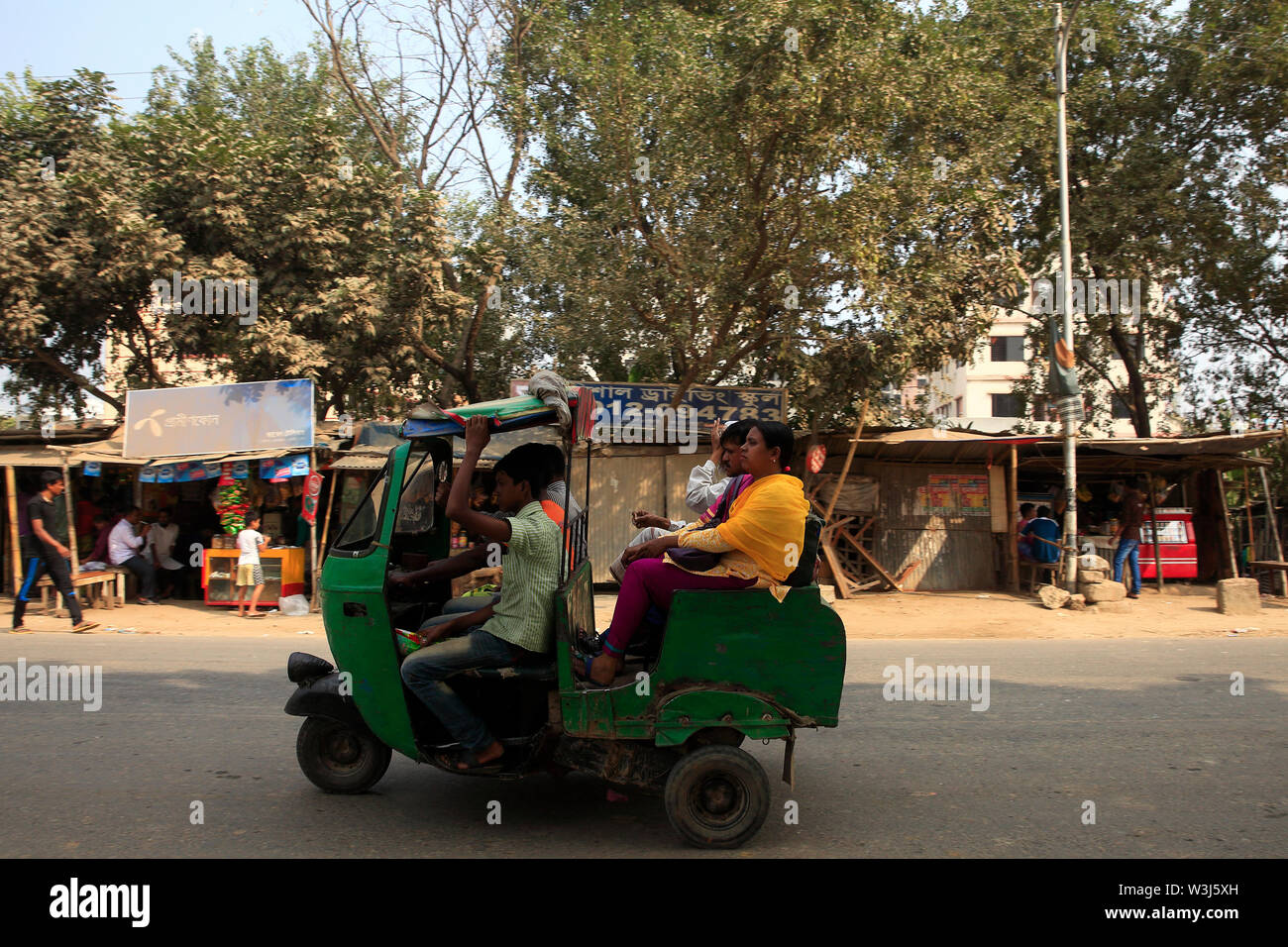 Auto rickshaw moving on the road, Chennai, Tamil Nadu, India Stock