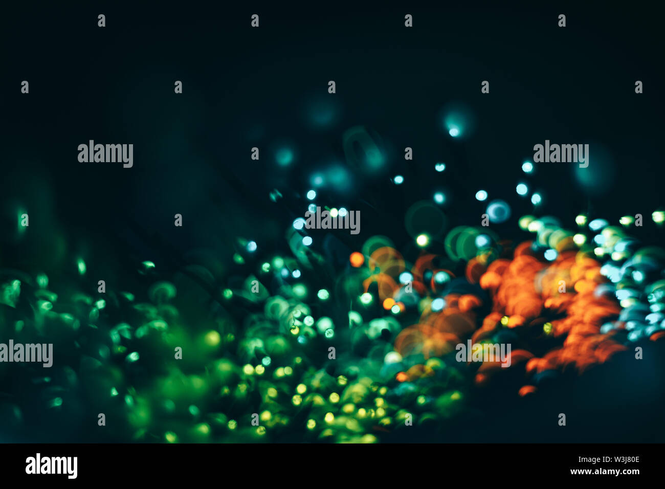 Beautiful colored bokeh on a dark abstract background Stock Photo - Alamy