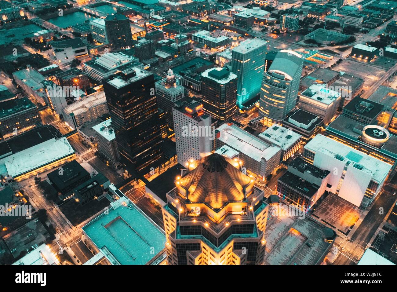 Aerial shot of the beautiful architecture of an urban city at night Stock Photo