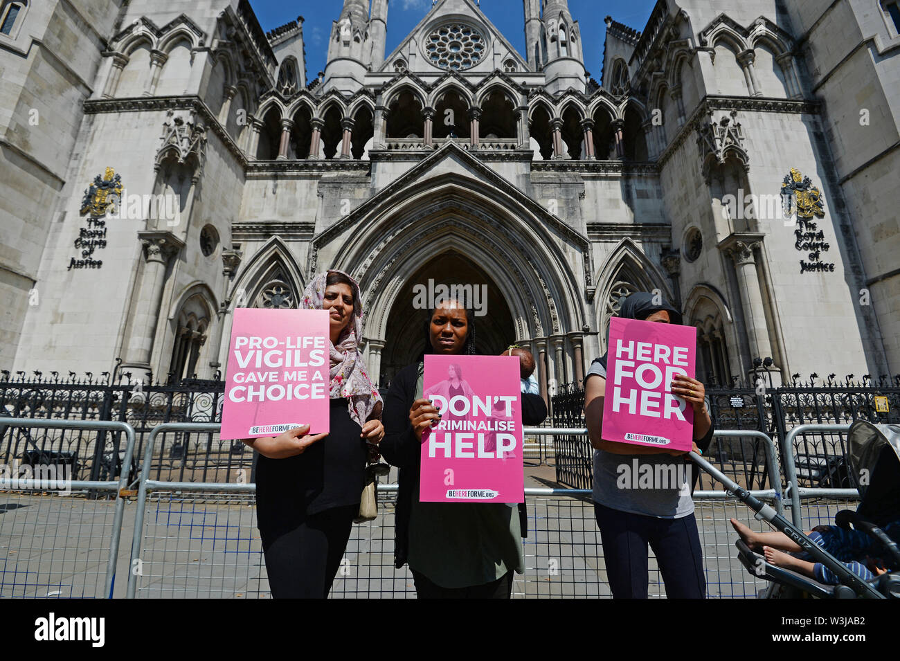 Three women, who were approached by Pro-Life vigils outside of abortion clinics in London, stand outside the Court of Appeal with their children, as an appeal against a ban on demonstrations outside a London abortion clinic is set to be heard. Stock Photo