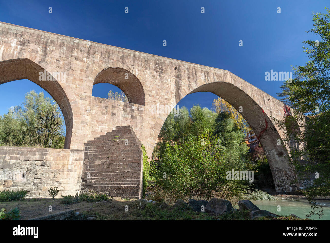 Sant Joan de les Abadesses, Catalonia, Spain. Old bridge, Pont Vell. Stock Photo